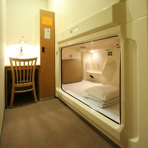 Deluxe Capsulehotel Alleen voor Mannen op de Lagere Verdiepingen